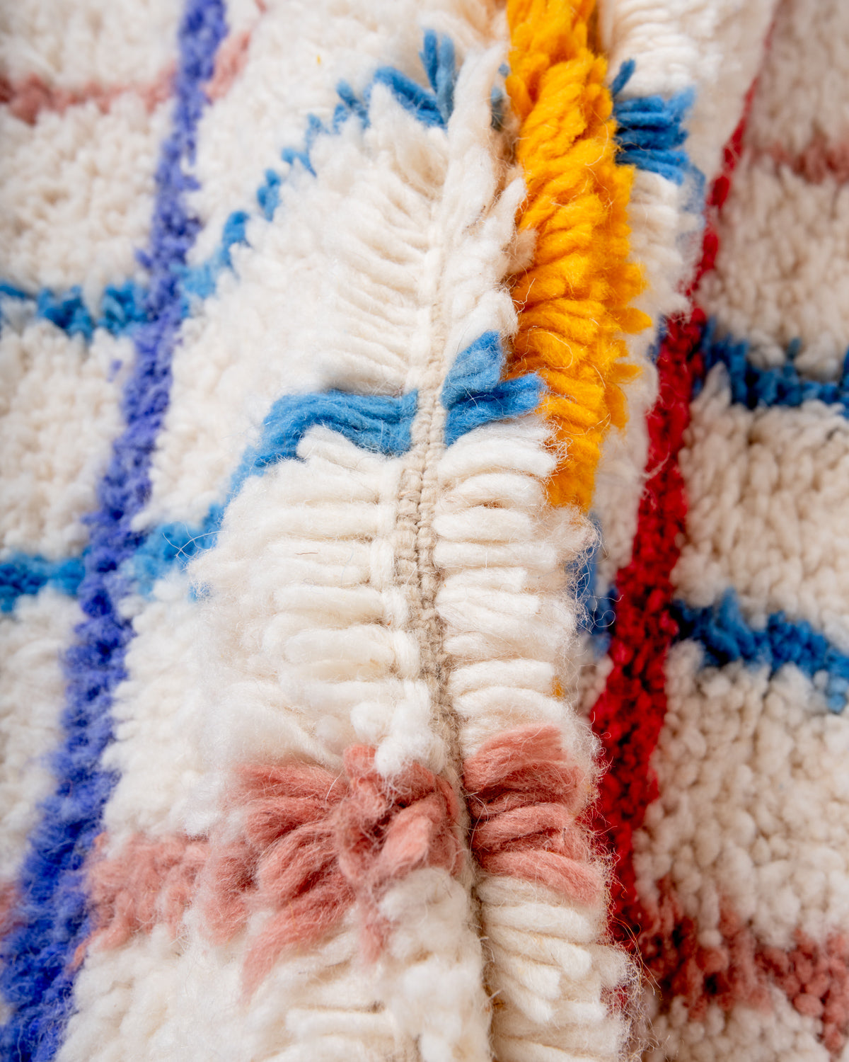Modern, designer, handcrafted Berber rug from Morocco. Beniourain carpet with beautiful colours and patterns and fluffy wool texture.